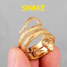 Description:Stainless Steel Snake RingSpecification:Size: adjustable 7#Weight: 9 g/pcsMaterial: stainless steel, gold, silverHypoallergenic: YesRing Color: Gold/Silver This Stainless Steel Snake Ring is the perfect accessory for adding a touch of edgy style to your outfit. Made from high-quality stainless steel, it is not only durable but also hypoallergenic. 🐍💍 Boyfriend Jewelry, Snake Ring Gold, Punk Rock Jewelry, Mens Stainless Steel Rings, Boys Jewelry, Mens Rings, Animal Rings, Punk Jewelry, Snake Ring