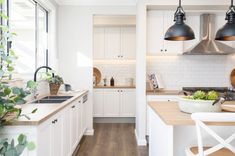 the kitchen is clean and ready to be used for cooking or eating, as well as other things in the house