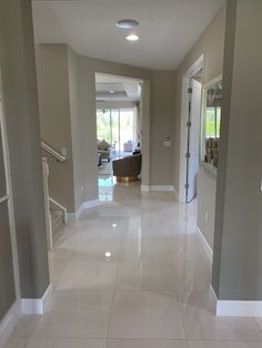 the hallway is clean and ready for us to use in this home's living room