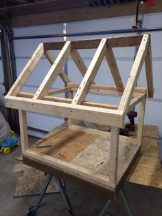 a wooden structure being built in a garage