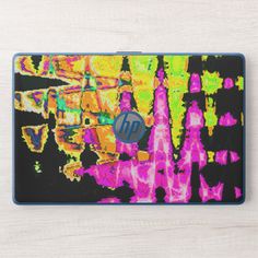 a laptop computer case with an abstract painting on the back and front cover that says hp