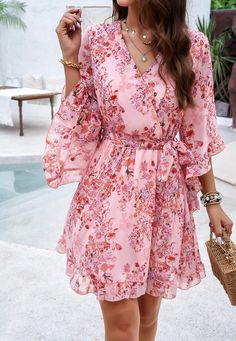 Flirty, flowy, and fabulously femme, our Sienna Floral Wrap Mini Dress is a must-have for any fashion-forward babe. Made with lightweight chiffon fabrication, this dress will keep you cool and chic all season long. Embrace your inner flower child with this playful and versatile piece. Size Guide: Model is 5’8” tall, and has a 33.4” bust, 26.4” waist, & 35.4” hips. She is wearing a S / US 4 / AU 8. This dress is true to size. Material: 100% Polyester. Feature: V-Neckline. Wrap front with waist tie. Short ruffle sleeves. Floral Print. Chiffon Fabrication. Mini length. Care Instructions: Machine wash / Cold hand wash Reindeer Headband, Wrap Mini Dress, Floral Print Chiffon, Floral Wraps, Daily Dress, Dress Jewelry, Pink Mini Dresses, Ruffle Sleeves, Mini Wrap Dress