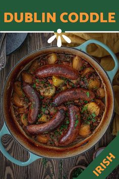 a pot full of sausages and potatoes on top of a wooden table with the words dublin