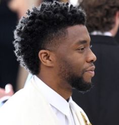 Afro Mohawk Men, Chadwick Boseman Haircut, Mullet Hairstyle Black Mens, Afro Hawk Hairstyles, Black Men Mohawk Hairstyles, Afro Mullet Black Man, Short Black Hairstyles Men, Black Man Mullet