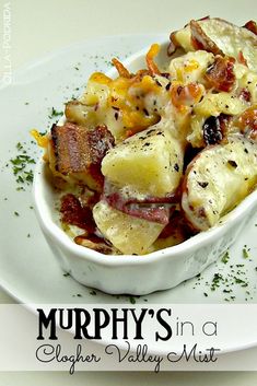 a white bowl filled with potatoes and bacon