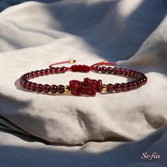 This red garnet dainty bracelet is fun and easy to wear and match with any outfit. They can express your style, mood, or personality in a subtle and charming way. It is perfect for anyone who loves minimalist style, natural stones. It is a unique and meaningful gift for yourself or someone special. You can wear it by itself or mix it with other bracelets for a fun and trendy look. If you have a large demand of the stone beads or bracelets, please feel free to contact us for details. - Material : Adjustable Spiritual Garnet Jewelry, Elegant Red Bracelets For Good Luck, Adjustable Burgundy Round Bead Bracelets, Adjustable Garnet Bracelets Gift, Adjustable Garnet Bracelet Gift, Adjustable Garnet Bracelet As Gift, Adjustable Garnet Jewelry For Gift, Adjustable Garnet Jewelry As A Gift, Red Garnet Bracelets As Gift