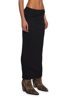 This maxi skirt has a stretchy ribbed knit construction with a ruched side design and an elastic waistband. Fitted Long Maxi Skirt With Ruched Detail, Fitted Ribbed Maxi Skirt, Fitted Ruched Black Maxi Skirt, Long Black Ribbed Skirt, Ribbed Maxi Skirt, Knit Maxi Dress, Side Design, Maxi Knit Dress, Black Maxi Dress