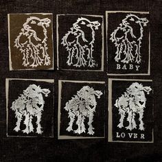 four different type of artwork on black cloth