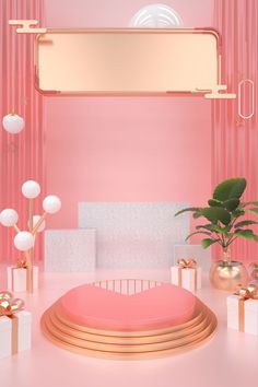 a room with pink walls, gold accents and white boxes on the floor next to a plant