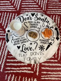 a plate that has some food on it and milk in front of it with the words dear santa here is my favorite cookie