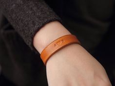 "Simple genuine leather band for him or her, Customized Bracelet, Personalized Bracelet for that special someone ★ Features: ★ ► Bracelets can be engraved on outside only  ► 7 beautiful colors to choose ,select one of the options below the title. ► 5 sizes: small, medium, large, x-large, 2x-large    ►  ( 1.5cm ) 0.6\" wide ★ Sizing:  ★ ► Small bracelets fit wrist diameters of 14cm or 5.5\" (Average Child wrist) ► Medium bracelets fit wrist diameters of 16cm or 6.25\" (Small Woman's wrist) ► Larg Leather Strap Wristband As Gift, Classic Wristband Gift, Classic Leather Bracelet Gift, Classic Adjustable Wristband As Gift, Classic Leather Bracelet As A Gift, Leather Wristband Gift, Personalized Leather Bracelet For Friendship, Classic Leather Bracelet With Leather Strap As Gift, Hand Stamped Brown Leather Bracelet Gift