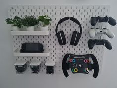 there are several video game controllers on the wall