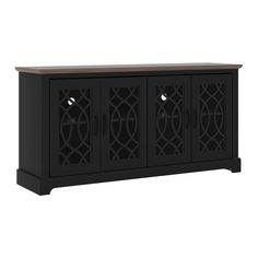 a black cabinet with four doors and an intricate design on the front, side view