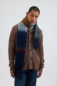 Woven scarf with an ombre look stripe pattern. Classic look cold weather scarf with a tassel fringe. Features Striped woven scarf Ombre look stripe scarf Fringe trim Content + Care Acrylic Spot clean Imported | Striped Woven Scarf in Navy, Men's at Urban Outfitters Mens Winter Scarf Fashion, Mens Scarf Fashion, Stripe Scarf, Woven Scarf, Woven Scarves, Striped Scarves, Color Inspo, Mens Scarves, Tassel Fringe