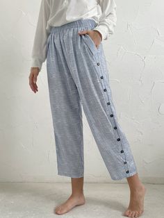 Casual Striped Loose Pants | justfashionnow Casual Straight Pants With Buttons, Casual Ankle-length Pants With Buttons, Casual Straight Bottoms With Buttons, Spring Tapered Leg Pants With Button Closure, Summer Tapered Leg Pants With Button Closure, Spring Tapered Pants With Button Closure, Spring Ankle-length Pants With Button Closure, Casual Pants With Buttons And Loosely Fitted Hips, Relaxed Fit Trousers With Buttons