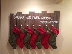 christmas stockings hanging on a wall with the words, give me more before christmas