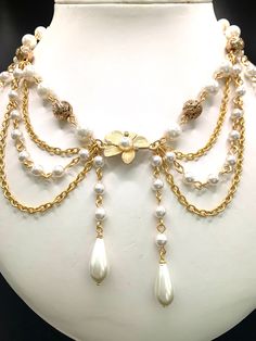 Welcome to my Shop! This Fairycore Pearl Choker Necklace has a focal gold flower with pearls.   It is surrounded with gold plated lava beads and  glass pearl beads.  The chains and the metal parts are gold plated brass. It is 16 inches and has an extension chain. If you want to change the length,I can customize this product for you. Please do not wear the necklace while sleeping, showering or doing sports. I advise you to try to keep it away from water, chemicals and perfumes. If you have any re Handmade Gold Metal Pearl Necklace, Gold Beaded Metal Pearl Necklace, Handmade Gold Pearl Necklace For Party, Ballroom Extravaganza, Cottagecore Necklace, Aesthetic Necklace, Necklace Aesthetic, Lava Beads, Pearl Choker Necklace