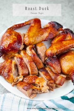 roast duck on a white plate