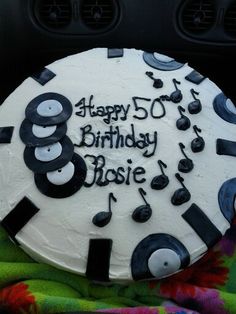 a birthday cake with music notes on it