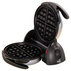 an electric waffle maker on a white background