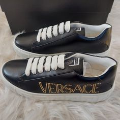 New Season Versace Logo Embedded Sneakers For Kids Size It38 Comes With Original Box Designer Slip-on Sneakers For Streetwear, Black Custom Lace-up Sneakers With Embroidered Logo, Black Custom Sneakers With Embroidered Logo, Black Lace-up Custom Sneakers With Embroidered Logo, Low-top Logo Embellished Sneakers For Streetwear, Luxury Black Sneakers With Embroidered Logo, Black Custom Sneakers With Logo Print And Round Toe, Custom Black Sneakers With Logo Print And Round Toe, Designer Streetwear Sneakers