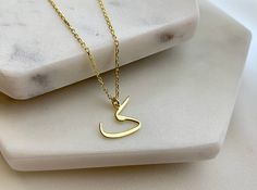 "This Farsi initial necklace ( Persian letter necklace) is perfect personalised gift for a mom, teenage girl, mother or daughter  birthday! Also, this personalised Farsi initial necklace would make a great gift for a bride, bridesmaid, grandma, girlfriend, best friend, baby shower, anniversary, wedding, engagement, graduation, valentine's day, bridal shower! Dainty, Farsi letter necklace has been produced with high quality 14k/8k solid gold or 925k solid silver and available in silver, gold, and rose gold colour.  FEATURES: * chain in different lengths * great for daily wear * hypoallergenic * nickel-free, lead-free & cadmium-free * handmade in the UK * arrives in gift box * can include your gift message (leave in Note to Seller at checkout) * free priority shipping within UK * internation Tan Initial Pendant Charm Necklace As Gift, Tan Initials Charm Necklace Gift, Tan Charm Necklace With Initials For Gift, Initial Pendant Necklace With Name For Her, Mother's Day Gift Name Necklace With Initial Pendant, Handmade Initial Pendant Necklace For Mother's Day, Mother's Day Gift Initial Pendant Name Necklace, Mother's Day Initial Necklace As A Gift For Her, Mother's Day Initial Name Necklace Gift For Her