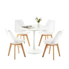 a white table with four chairs around it