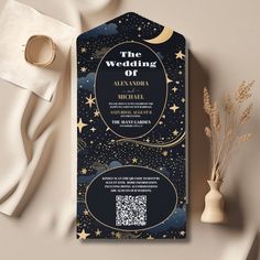 a black and gold wedding card with stars on it