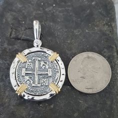 This coin is made from the silver bars recovered from the Atocha. I use moulds from the original coins to get the print. This is a replica but actually made from the silver from the Atocha. The frame around is sterling silver with a 14kt gold overlay and the prongs are sterling silver for an amazing contrast. I use a hammered finish for the frame that gives this piece a beautiful and rich appearance. This is a big, beautiful and statement piece. A true eye-catcher and a stunning piece of history Key West Fl, Gold Overlay, Shipwreck, Silver Bars, Key West, 14kt Gold, Statement Pieces, Jewelry Necklace Pendant, Coin