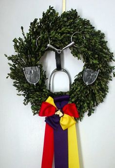 a wreath is hanging on the wall