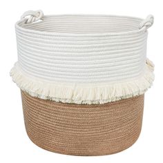 a large white and beige basket with tassels