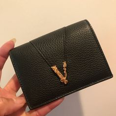 Brand New Pebbeled Black Versace Wallet With Brushed Gold Hardware. Luxury Wallets With Gold-tone Hardware As Gift, Versace Clutch, Luxury Black Wallets With Interior Card Slots, Luxury Black Elegant Wallets, Versace Wallet, Designer Black Wallets With Gold-tone Hardware, Clutches For Women, Versace Bags, Cute Purses