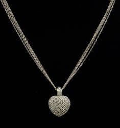 Sterling silver and diamond heart necklace. At the end of the 18 inch sterling chain hangs a 1 inch heart pendant set with small diamonds throughout. The perfect gift to tell that special someone how you feel! Each piece has been hand selected and meticulously identified and graded by a Graduate Gemologist who has been awarded a degree by the Gemological Institute of America (GIA). Please visit our Shop's About Page or our website for more information about our jewelry. If you have any questions Silver Heart Pendant Diamond Necklace With Accents, Silver Diamond Accented Heart Pendant Necklace, Silver Diamond Necklace With Heart Pendant, Valentine's Day Heart Pendant Diamond Necklace, Silver Heart Pendant Necklace With Brilliant Cut, Sterling Silver Double Heart Diamond Necklace For Formal Occasion, Silver Double Heart Diamond Necklace For Formal Occasions, Formal Heart-shaped Sterling Silver Diamond Necklace, Silver Brilliant Cut Diamond Necklace For Valentine's Day