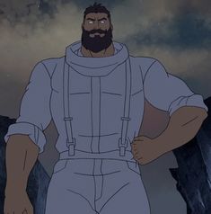 a man with a beard and overalls standing in front of some rocks under a cloudy sky