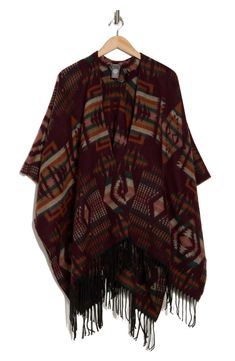 Chilly weather calls for this cozy fringe-trimmed jacquard topper that you'll love to layer. 43" length (one size) Open front Three-quarter sleeves 100% acrylic Hand wash, dry flat Imported Fringe Shawl Outerwear For Fall, Winter Fringe Shawl Outerwear, One Size Winter Outerwear With Fringe, Chilly Weather, Three Quarter Sleeves, Vince Camuto, Three Quarter, Front Open, Nordstrom Rack