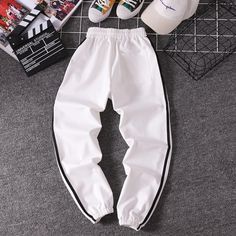 FREE SHIPPING Women Striped Jogger Pants JKP1809 White Baggy Joggers, Baggy White Sporty Joggers, Sporty White Baggy Joggers, White Jogging Bottoms With Elastic Side Panels, White Bottoms With Elastic Side Panels For Jogging, White Jogging Pants With Elastic Side Panels, White Jogging Pants With Elastic Waistband, Baggy White Joggers, Casual White Joggers With Elastic Side Panels