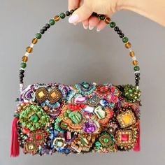 Hand Embroidered Colorful Beaded Bag, Luxury Evening Clutch Bag, Large Multi Color Bead Handbag, Formal Event Clutch Purse Bag, Gift for her Stunning hand-embroidered bag for a special woman. ✴ WOULD YOU LIKE TO HAVE A STRIKING ACCESSORY TO ELEVATE YOUR LOOK IN A SINGLE GESTURE? This accessory will add value to the casual, most neutral looks and more elaborate compositions, allowing them to be elevated to another level. This is a one-of-a-kind handcrafted piece that every confident and empowered Bead Handbag, Embellished Bags, Embroidered Clutch, Embroidery Bags, Beaded Bag, Beaded Handbag, Bag Luxury, Embroidered Bag, Beaded Purses