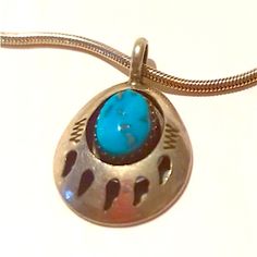 Pretty Vintage Native American Bear Paw Pendant With Beautiful Blue Turquoise Stone. Stone Is Set In A Shadowbox And The Bear Paw Cut Out Which Is Made With 2 Layers Of Silver. Handcrafted By Known Navajo Artist, Teddy Goodluck, Signed Tg With A Four Leaf Clover. This Is His Signature Shadowbox Design Chain Not Included, Price Is For Pendant Only Weight 2.73 Grams Measures 1 1/8 Inch With The Bale And 1 ” 3/4 Without Stamped Sterling Hallmark Tg And A Four Leaf Clover New, Never Worn From 1980s Southwestern Style Blue Turquoise Nickel-free Necklace, Nickel-free Southwestern Blue Turquoise Necklace, Southwestern Style Nickel-free Blue Turquoise Necklace, Blue Nickel-free Southwestern Turquoise Necklace, Southwestern Blue Turquoise Inlay Necklace, Porcupine Quill Jewelry, Native American Bear, Paw Pendant, Grunge Hippie