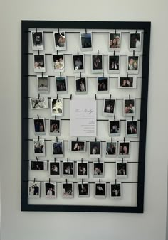 a black and white photo frame with photos on it