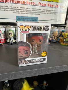 the pop vinyl figure is on display in front of many other pop - up figurines