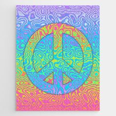 a colorful peace sign on a pink background