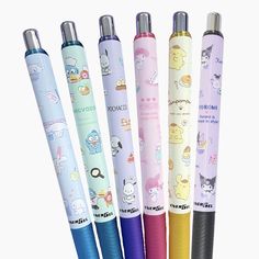 four pens with cartoon characters on them are lined up in different colors and sizes,