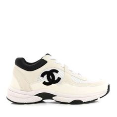 This Is An Authentic Pair Of Chanel Mesh Suede Calfskin Grained Calfskin Womens Cc Sneakers Size 36 In White And Black. These Stylish Sneakers Are Crafted Of White Leather, Suede Leather, And Mesh Fabric With A Black Chanel Cc Logo On One Side And Rubber Soles. These Are Brand New Never Worn, Includes Both Dust Bags And Will Be Shipped In Original Box. Chic Leather Sneakers With Perforations, Chic Low-top Sneakers With Perforations, Chic White Sneakers With Textured Sole, Chic Leather Sneakers For Streetwear, Chic White Low-top Sneakers, Chic White Sneakers With Rubber Sole, Channel Sneaker, Chanel Sneakers, Cc Logo