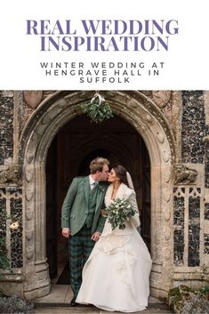 a bride and groom kissing in front of an archway with the text real wedding inspiration winter wedding at hencravehall in suffolk