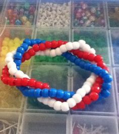 three bracelets with red, white and blue beads