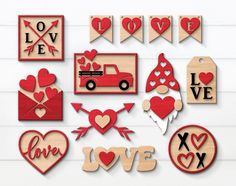 valentine's day cutouts are displayed on a white background with hearts and arrows