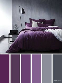 a bedroom with purple and grey colors