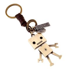 a keychain shaped like a robot with keys attached to it