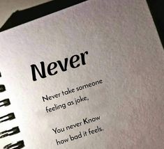 a notebook with the words never written on it