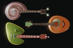 three guitars are arranged on a black background